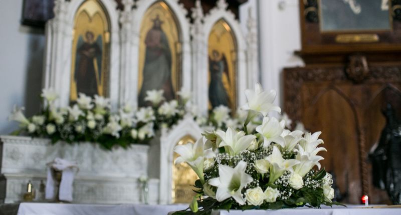 Flower-Adorned Altar Church Wedding Decorations