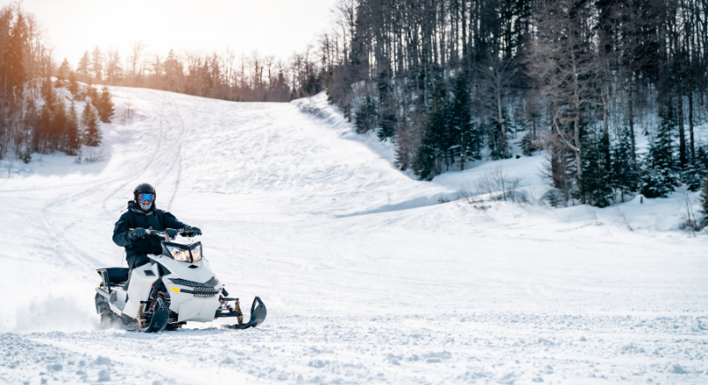 Groom Arrive on a Snowmobile