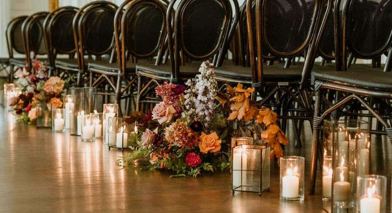 Mason Jar Candles on Pews