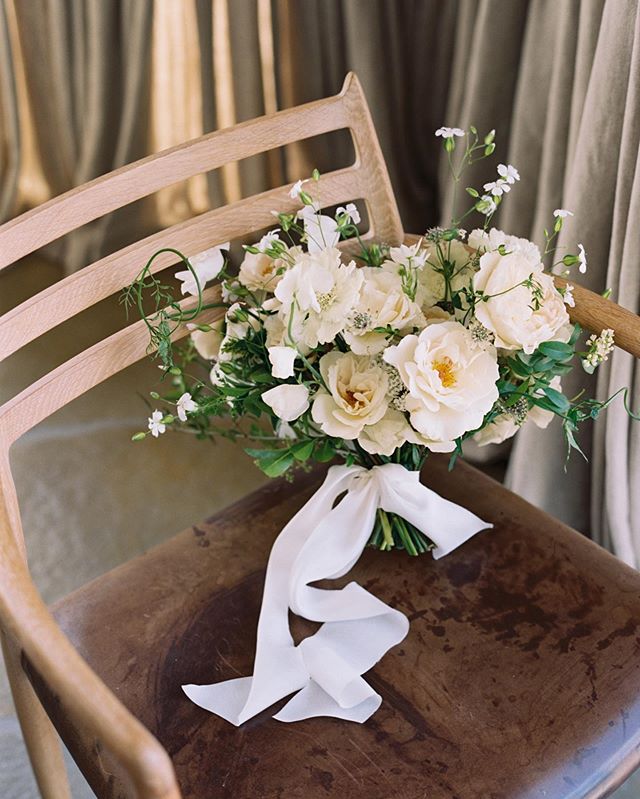 Alice’s Summer bouquet with Margaret Merrill roses and beautiful @lancasterandcornish silk ribbon. 
Image by @taylorandporter
