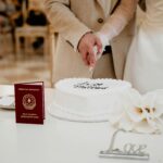 bride cutting traditional wedding cake